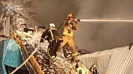 Firefighters battling fire