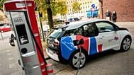 An electric car connected to a charging station in Hamburg, Germany.