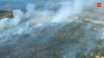 Vista del incendio forestal declarado en Lozoyuela, al norte de la Comunidad de Madrid. 16 de julio de 2026.