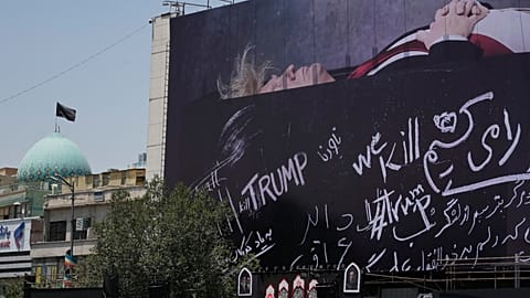 A billboard depicting Donald Trump lying on what appears to be a coffin, and bearing anti-Trump messages in the Islamic Revolution Square in Tehran, Iran. July 15, 2026.