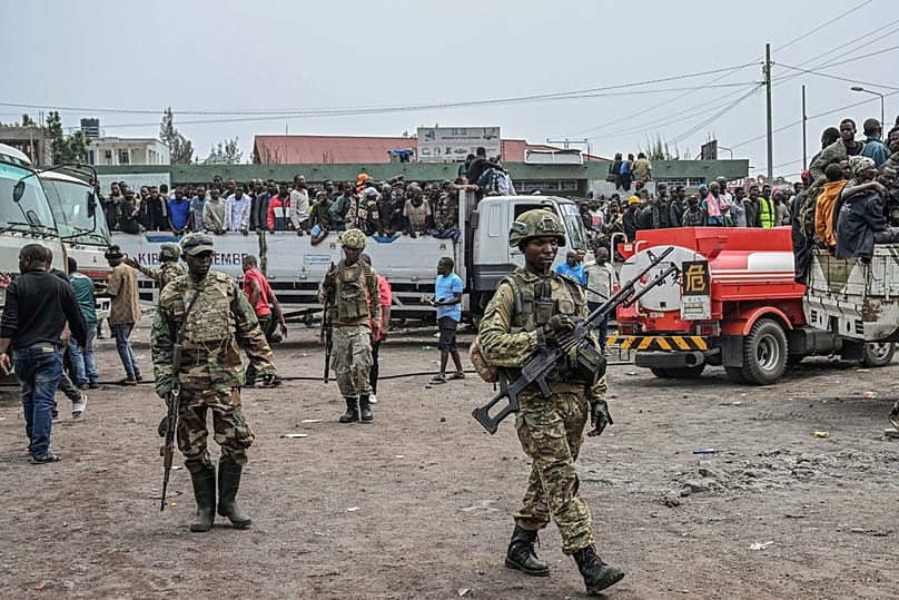 FILE - M23 rebels escort government soldiers and police who surrendered to an undisclosed location in Goma, Democratic republic of the Congo, Jan. 30, 2025. 