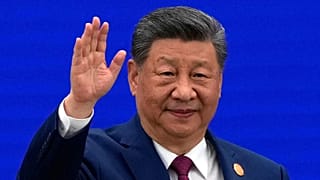 Chinese President Xi Jinping waves as he arrives at the opening ceremony for the World AI Conference in Shanghai, Friday, July 17, 2026. (AP Photo/Ng Han Guan, Pool)