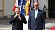 Chancellor Merz welcomes French President Macron with military honors at Augustusburg Palace ahead of a meeting of the Franco-German Ministerial Council, Friday, July 17, 2026