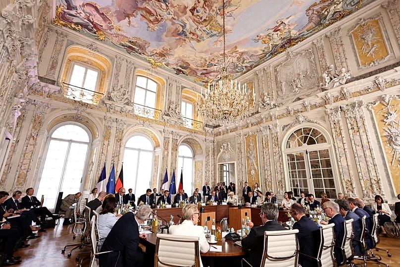 Chancellor Merz and French President Macron attend the plenary session of the Franco-German Ministerial Council at Augustusburg Palace in Brühl, Germany, Friday, July 17, 2026