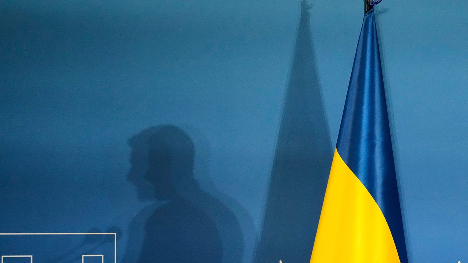 FILE: The shadow of Ukraine's President Volodymyr Zelenskyy is projected on a wall at La Nuvola convention center in Rome, Thursday, July 10, 2025