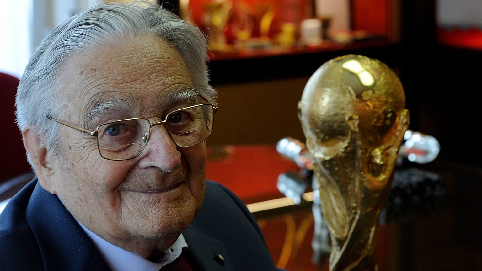 FILE: Italian goldsmith and sculptor Silvio Gazzaniga with his most important work, the FIFA World Cup, at GDE Bertoni factory in Paderno Dugnano near Milan, June 3, 2014