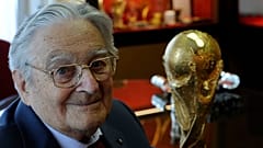 FILE: Italian goldsmith and sculptor Silvio Gazzaniga with his most important work, the FIFA World Cup, at GDE Bertoni factory in Paderno Dugnano near Milan, June 3, 2014