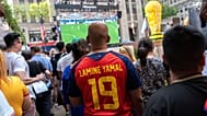 A Spain fan wears a Lamine Yamal jersey during the World Cup semifinal soccer match between Spain and France, Tuesday, 14 July, 2026, in New York.