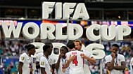 Harry Kane and his England teammates celebrate after beating France 6-4 to secure third place at the World Cup.