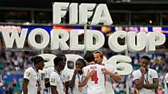 Harry Kane and his England teammates celebrate after beating France 6-4 to secure third place at the World Cup.