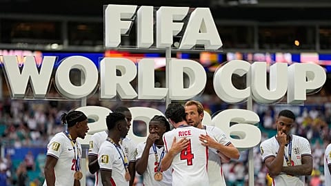 Harry Kane and his England teammates celebrate after beating France 6-4 to secure third place at the World Cup.