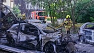 A firefighter puts out a fire following a Russia missile attack in Kyiv