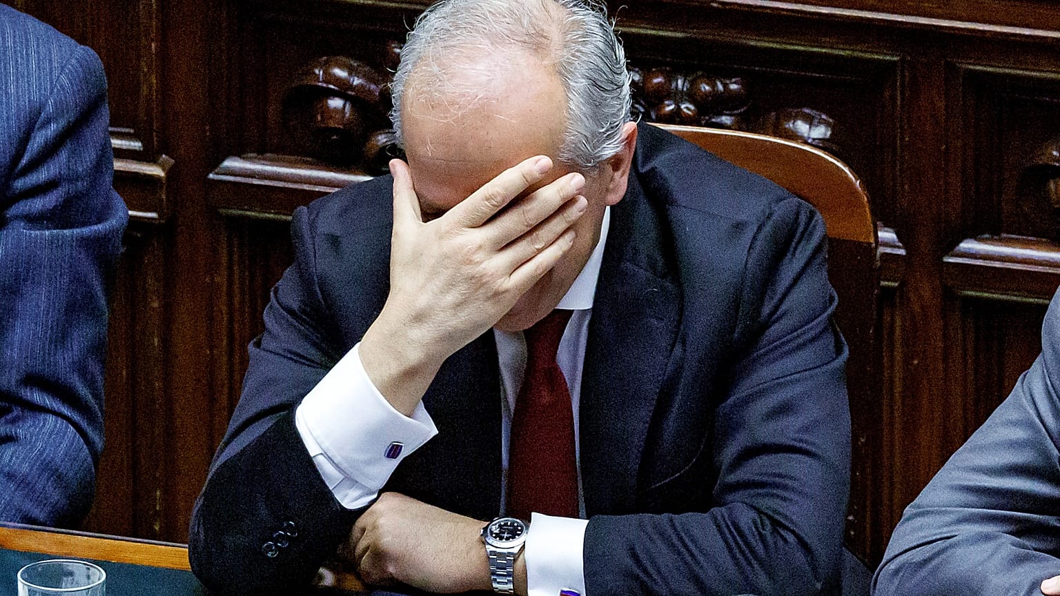 Italy’s Interior Minister Matteo Piantedosi holds his head as he addresses the parliament in Rome, Thursday, Feb. 29, 2024