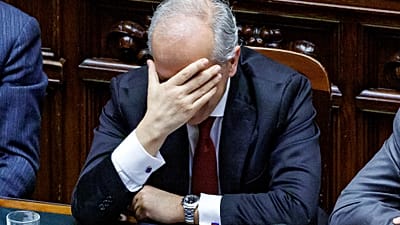 Italy’s Interior Minister Matteo Piantedosi holds his head as he addresses the parliament in Rome, Thursday, Feb. 29, 2024