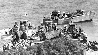 Turkish army supplies are unloaded from landing craft onto the beaches near the northern port of Kyrenia, Cyprus 27 July, 1974