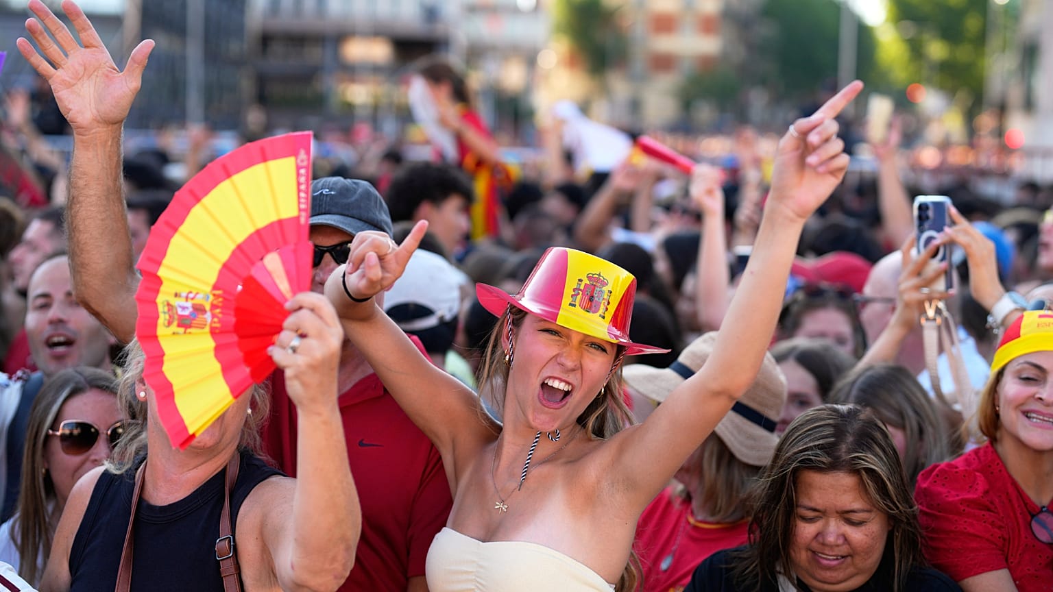 Spanish fans gather in central Madrid ahead of the World Cup final soccer match between Spain and Argentina near New York, July 19, 2026. 