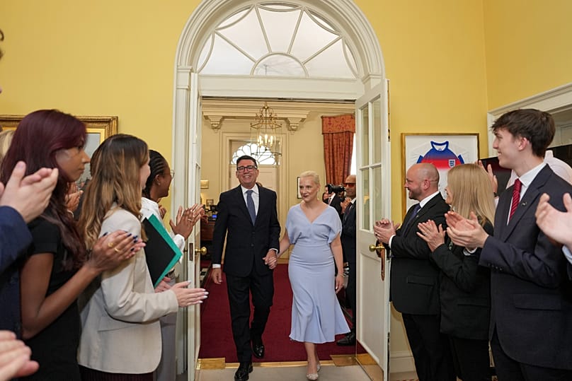 Burnham and his wife Marie-France van Heel were greeted by staff after entering Downing Street for the first time. 20 July, 2026.