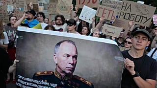 Activists hold a portrait of Ukraine's Armed Forces Commander-in-Chief Oleksandr Syrskyi demanding his resignation. Kyiv, Ukraine, July 18, 2026.