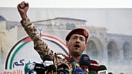 Houthi military spokesman Yahya Saree speaks at a rally against the US and Israel in Sanaa, 18 April 2025