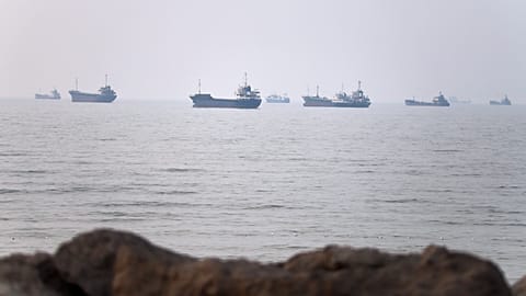 Commercial vessels are seen in the Strait of Hormuz off Bandar Abbas, Iran, Tuesday, June 30, 2026. 
