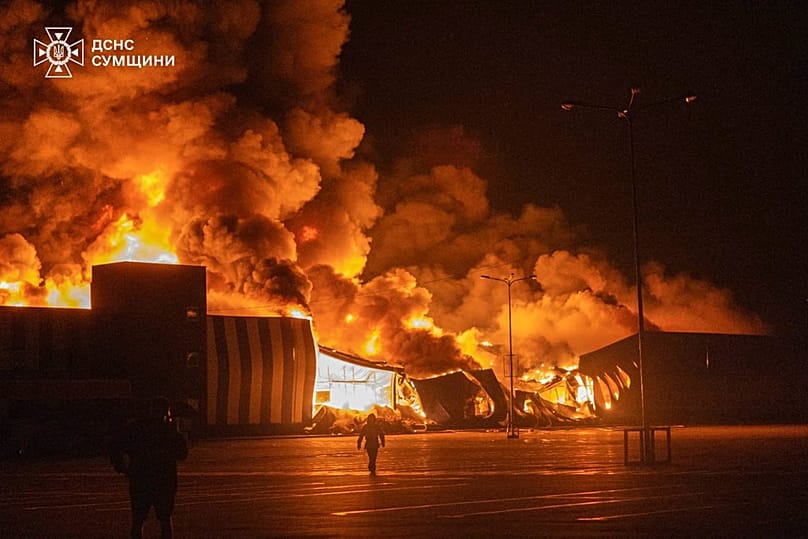 In this photo provided by the Ukrainian Emergency Service, firefighters put out a fire following a Russian air attack in Sumy, Ukraine, Tuesday, July 21, 2026