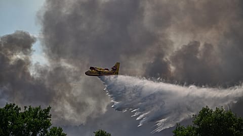 Wildfire spreads in southeastern France as firefighters battle blaze