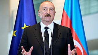 Azerbaijan's President Ilham Aliyev attends a news conference after a meeting with German Chancellor Friedrich Merz in Berlin, 21 July 2026
