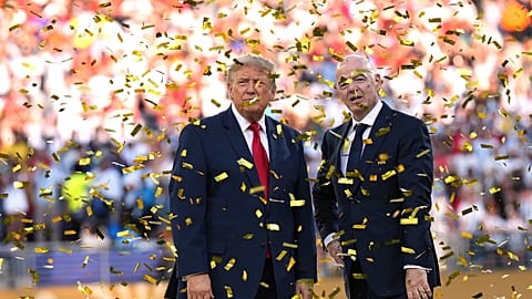 President Donald Trump, left, and FIFA President Gianni Infantino watch confetti fall at the conclusion of the World Cup final.