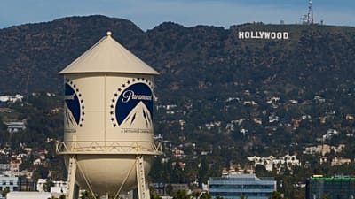 FILE - The Paramount Pictures water tower is seen in Los Angeles, 18 Dec., 2025, with the Hollywood sign in the distance. (AP Photo/Jae C. Hong, File)