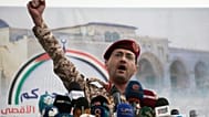 FILE - Houthi military spokesman Yahya Saree speaks at a rally against the US and Israel in Sanaa, Yemen, April 18, 2025. 