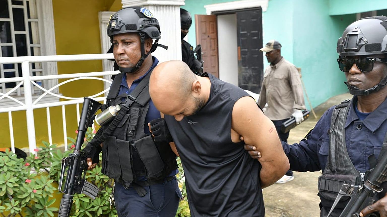 A photo showing a man being arrested following a raid by the Liberian National Police on 21 July 2026. Credit: Liberian National Police/Facebook.