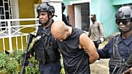 A photo showing a man being arrested following a raid by the Liberian National Police on 21 July 2026. Credit: Liberian National Police/Facebook.