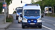 ARCHIVO - Vehículos policiales circulan por una calle de Alemania