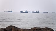 Commercial vessels are seen in the Strait of Hormuz off Bandar Abbas, Iran, Tuesday, June 30, 2026.