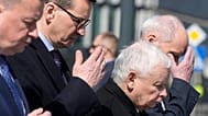 Jaroslaw Kaczynski (second right) the head of Law and Justice, and former prime minister Mateusz Morawiecki (left).