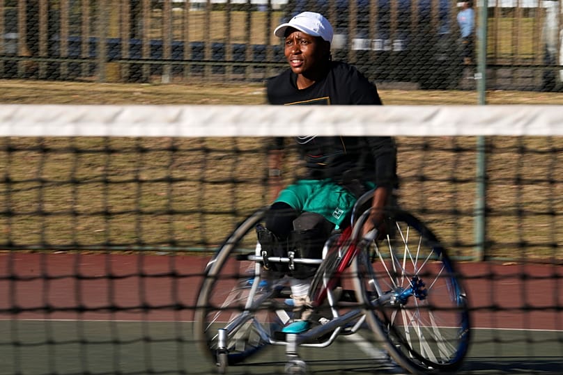 Kgothatso Montjane, a South African Paralympic wheelchair tennis champion, follows the ball during practice in Pretoria, South Africa, Saturday, Aug. 1, 2026.