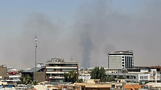 Black smoke rises following explosions near a military base hosting U.S. forces in the northern Iraqi city of Irbil, Friday, 24 July, 2026. (AP Photo/Stella Martany)
