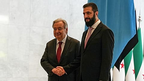 Syrian President Ahmad al-Sharaa welcomes United Nations Secretary General Antonio Guterres at the Syrian presidential palace in Damascus, Syria, Saturday, July 25, 2026.