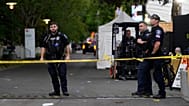 Police respond to a shooting at Seattle Center during the Bite of Seattle food festival Sunday, July 26, 2026, in Seattle, Washington