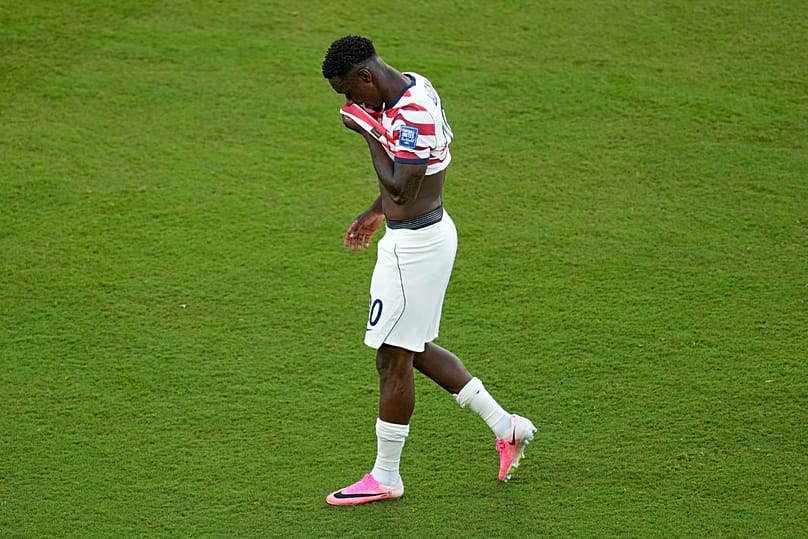 United States' Folarin Balogun (20) reacts to a red card during the World Cup round of 32 soccer match between the United States and Bosnia in Santa Clara, Calif.