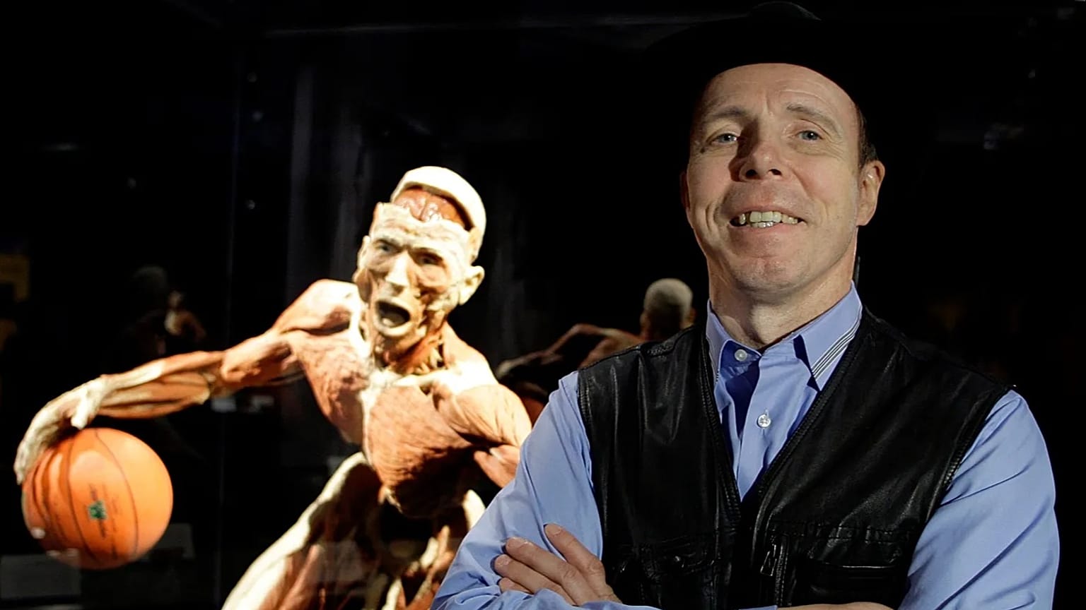 German anatomist Gunther von Hagens, creator of the Body Worlds exhibitions and known as "Dr Death", poses with one of his works in Istanbul, June 11, 2010.
