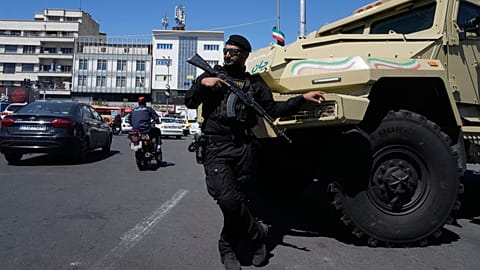 FILE: A member of Iran's police special forces stands guard in Tehran, 24 April 2026