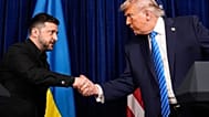 US President Donald Trump, right, shakes hands with Ukrainian President Volodymyr Zelenskyy before a joint news conference at Trump's Mar-a-Lago club, 28 Dec, 2025.
