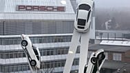 File - A sculpture with Porsche cars stands in the compound of the Porsche car manufactory in Stuttgart, 11 March 2016.