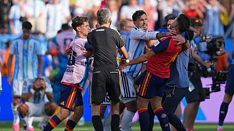Argentina's Leandro Paredes (5) grabs Spain's Eric Garcia (4) by the neck after the World Cup final match between Spain and Argentina in East Rutherford, July 19, 2026.