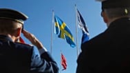 ABD'nin Virginia eyaletindeki bir NATO üssünde askerler selam veriyor, 11 Mart 2024.