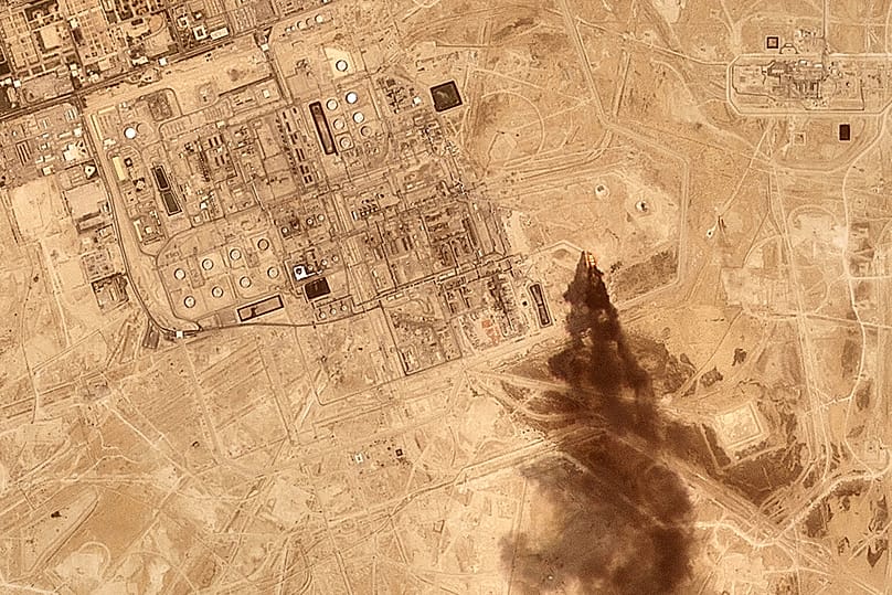 This satellite image provided by Planet Labs PBC on July 27, 2026 shows smoke rising from the Saudi Aramco oil processing facility in Abqaiq, Saudi Arabia, 2026