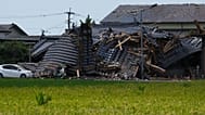 A residential building is seen damaged in Hikawa, southern Japan, Thursday, July 30, 2026, two days after an earthquake hit the area