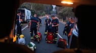 Varios bomberos se preparan para continuar con la extinción de un foco en el municipio de El Tiemblo, Ávila, el 29 de julio de 2026