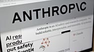 FILE - Pages from the Anthropic website and the company's logo are displayed on a computer screen in New York, Feb. 26, 2026